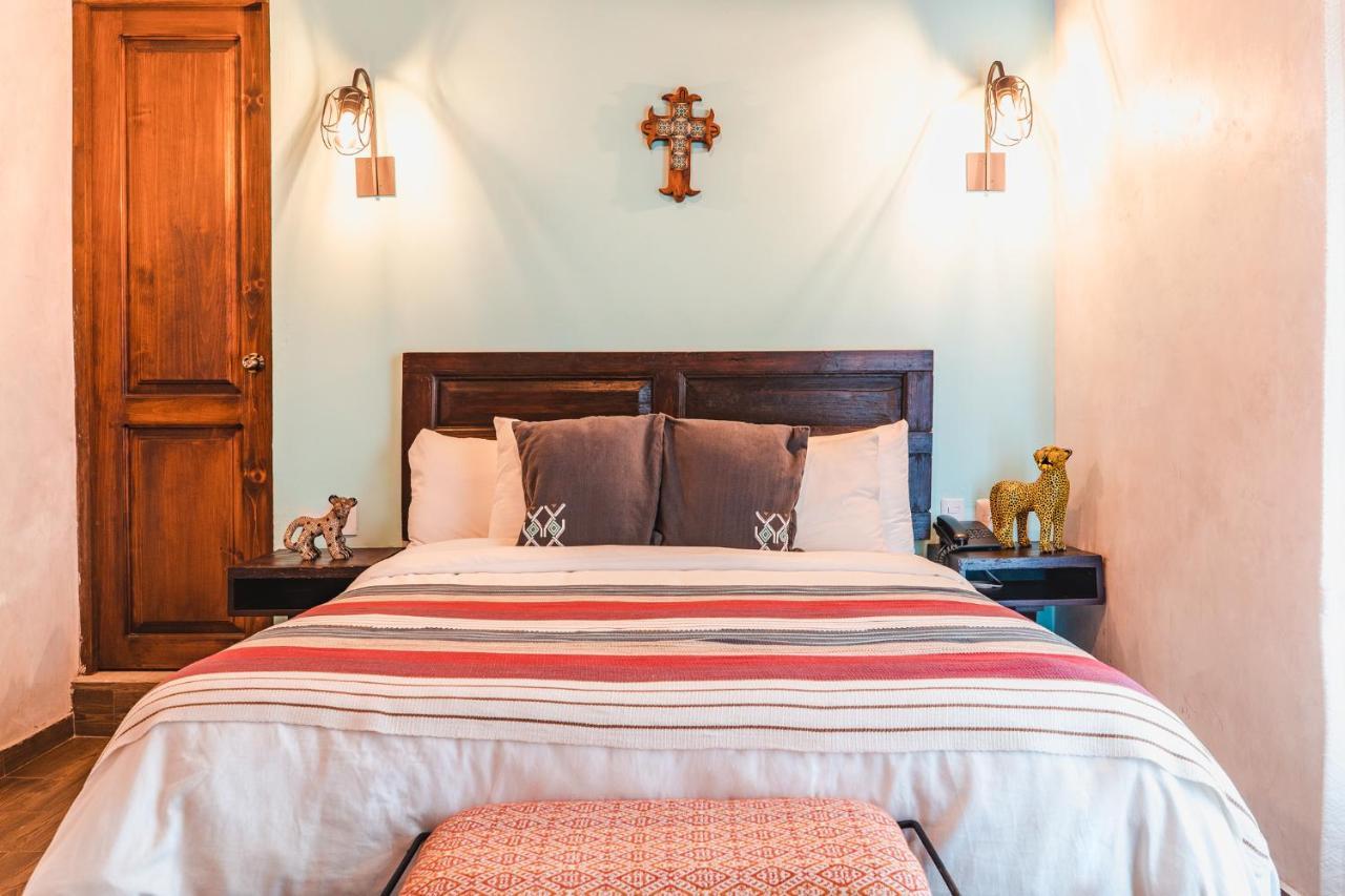 Yox Hotel Boutique San Cristóbal de Las Casas Екстериор снимка A bedroom at the hotel